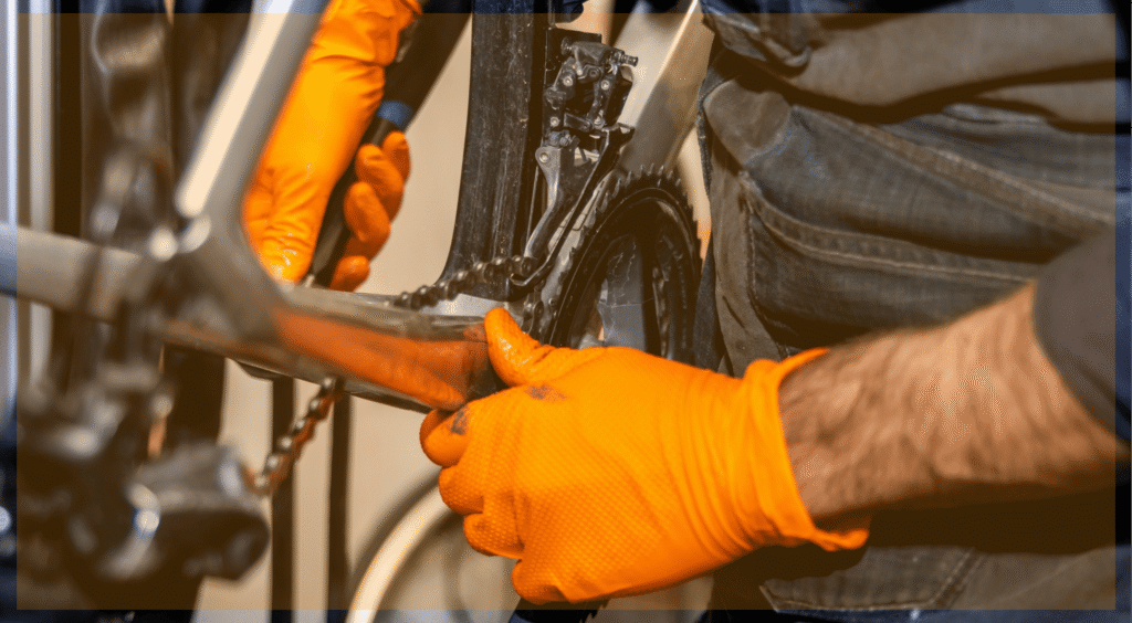 A close-up view of road bike shifters and handlebars outdoors, illustrating why people wear gloves while working on bike shifters for grip, safety, and maintenance